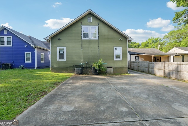 1177 Arlington Ave SW, Atlanta, GA 30310 - rear view of house with central AC unit and a patio area