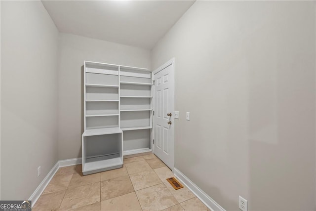 1451 Tappan Spur Dr, Watkinsville, GA 30677 - doorway to outside with baseboards and light tile patterned flooring