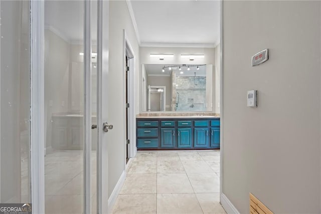 1451 Tappan Spur Dr, Watkinsville, GA 30677 - hall featuring ornamental molding, a sink, and light tile patterned floors
