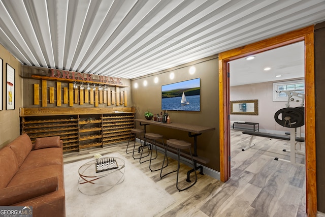 1451 Tappan Spur Dr, Watkinsville, GA 30677 - living room featuring wood finished floors and recessed lighting