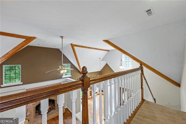 1451 Tappan Spur Dr, Watkinsville, GA 30677 - corridor with plenty of natural light, an upstairs landing, lofted ceiling, and wood finished floors