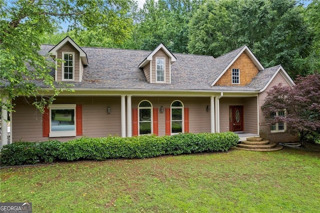1451 Tappan Spur Dr, Watkinsville, GA 30677 - cape cod-style house with a front lawn, roof with shingles, and a porch