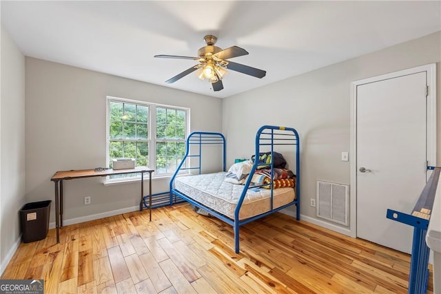1451 Tappan Spur Dr, Watkinsville, GA 30677 - bedroom featuring wood finished floors, baseboards, and a ceiling fan