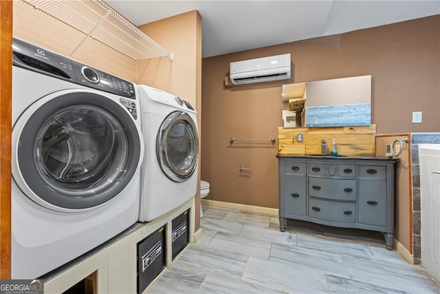 1451 Tappan Spur Dr, Watkinsville, GA 30677 - laundry area with a wall mounted air conditioner, washer and dryer, baseboards, and light marble finish floors