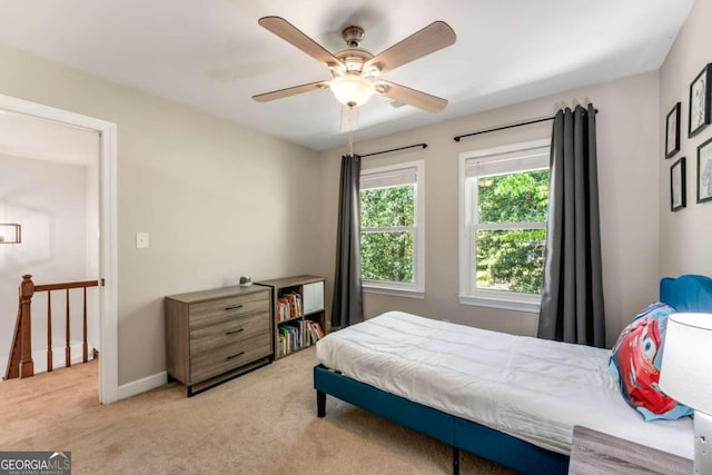 2356 Defoors Ferry Rd NW, Atlanta, GA 30318 - carpeted bedroom with baseboards and a ceiling fan