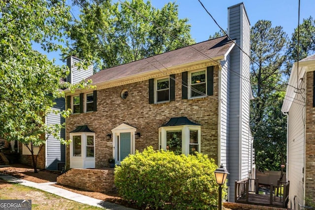 2356 Defoors Ferry Rd NW, Atlanta, GA 30318 - view of front of home featuring a chimney and brick siding