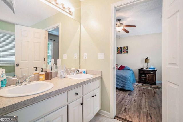 287 Jeremy Dr, Colbert, GA 30628 - full bath with ceiling fan, double vanity, ensuite bath, and baseboards