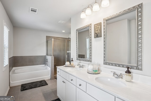 2127 Apple Orchard Way, Austell, GA 30168 - full bathroom featuring a garden tub, tile patterned floors, double vanity, and a shower stall