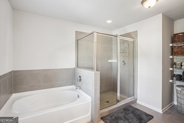 2127 Apple Orchard Way, Austell, GA 30168 - full bathroom with a garden tub, a stall shower, tile patterned flooring, and recessed lighting