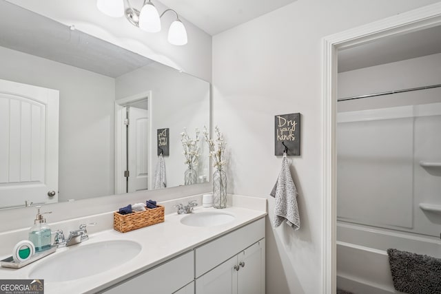2127 Apple Orchard Way, Austell, GA 30168 - bathroom featuring double vanity and tub / shower combination