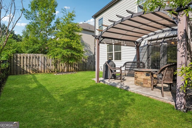 2127 Apple Orchard Way, Austell, GA 30168 - fenced backyard with an outdoor fire pit, a pergola, and a patio area