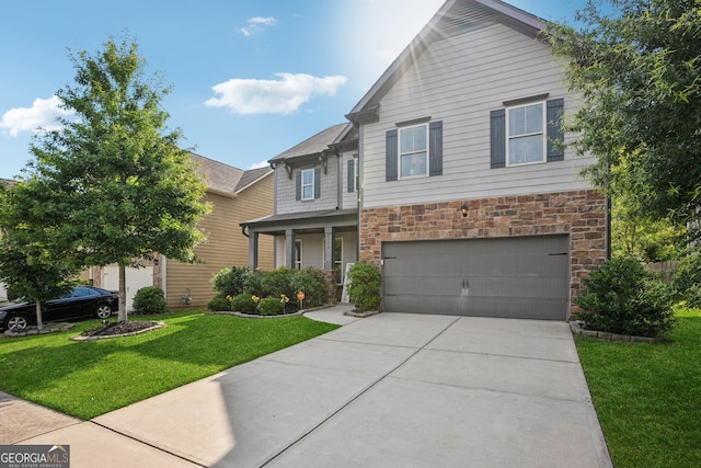 2127 Apple Orchard Way, Austell, GA 30168 - view of front facade featuring stone siding, an attached garage, a front yard, and concrete driveway