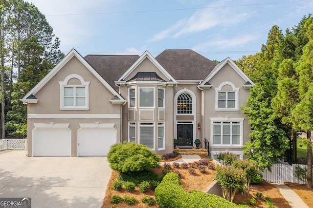 3495 Mill Bridge Dr, Marietta, GA 30062 - traditional home with driveway, a garage, and stucco siding