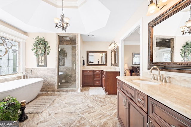 3495 Mill Bridge Dr, Marietta, GA 30062 - bathroom with a chandelier, a stall shower, two vanities, marble finish flooring, and a soaking tub
