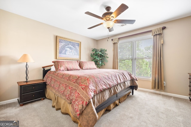 3495 Mill Bridge Dr, Marietta, GA 30062 - bedroom with baseboards, light carpet, and ceiling fan