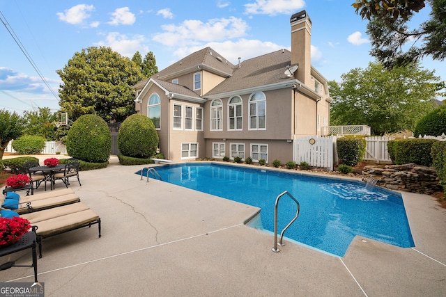 3495 Mill Bridge Dr, Marietta, GA 30062 - view of swimming pool featuring a patio area and a diving board