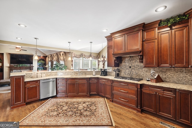 3495 Mill Bridge Dr, Marietta, GA 30062 - kitchen with appliances with stainless steel finishes, a sink, a peninsula, light wood-style flooring, and open floor plan