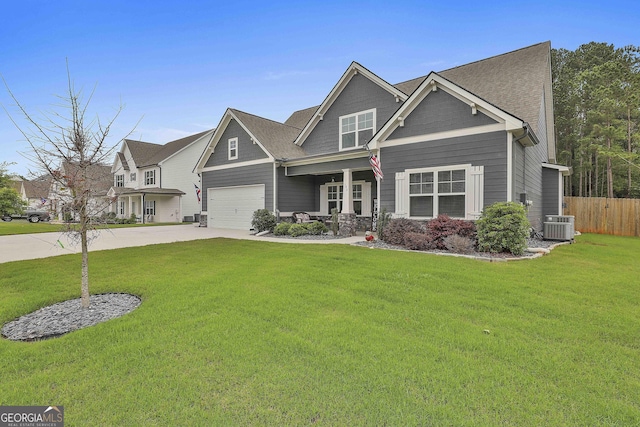 390 Cushing St, Senoia, GA 30276 - craftsman house with concrete driveway, central AC unit, a garage, and covered porch