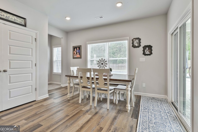 390 Cushing St, Senoia, GA 30276 - dining room with wood finished floors, baseboards, and recessed lighting