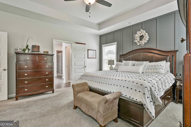 390 Cushing St, Senoia, GA 30276 - bedroom with light carpet, baseboards, and ceiling fan
