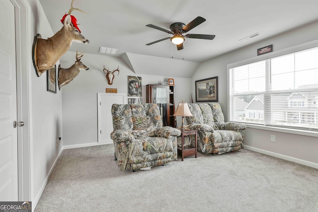 390 Cushing St, Senoia, GA 30276 - sitting room with carpet floors, ceiling fan, baseboards, and lofted ceiling