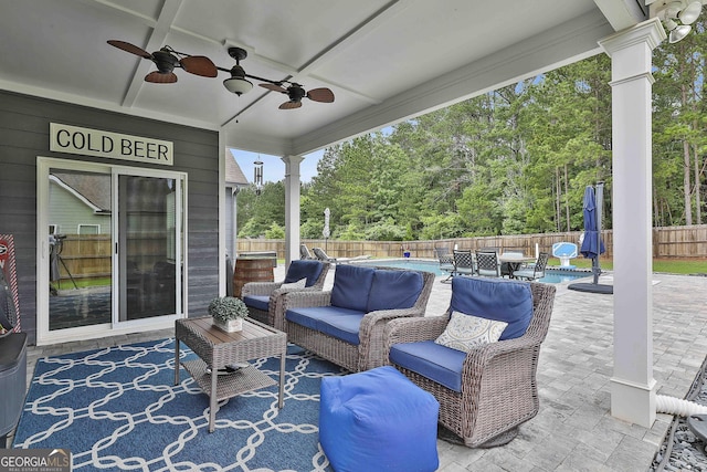 390 Cushing St, Senoia, GA 30276 - fenced backyard featuring a ceiling fan, an outdoor living space, and a patio area