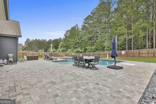 390 Cushing St, Senoia, GA 30276 - fenced backyard featuring a patio and outdoor dining area