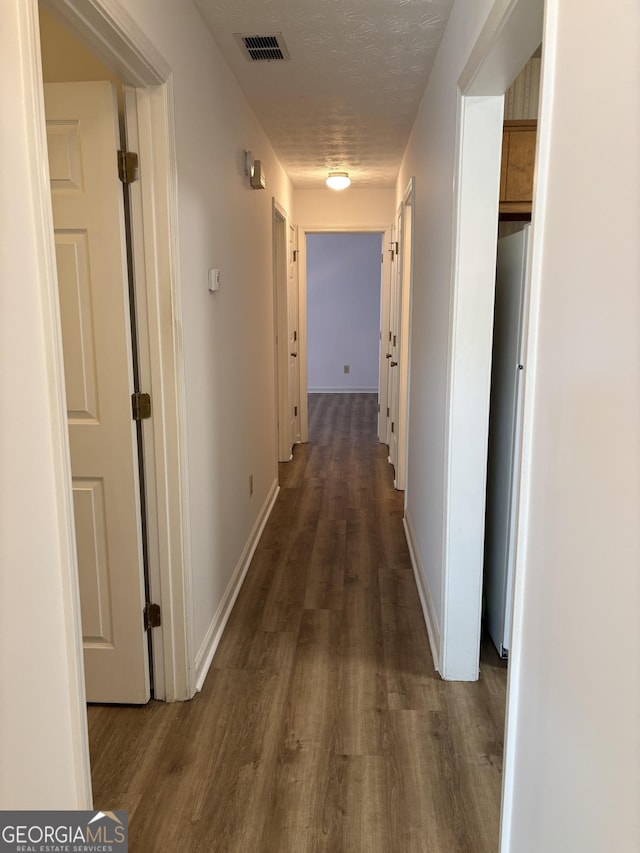 135 Courtyard Ln, Fayetteville, GA 30215 - corridor with wood finished floors and baseboards
