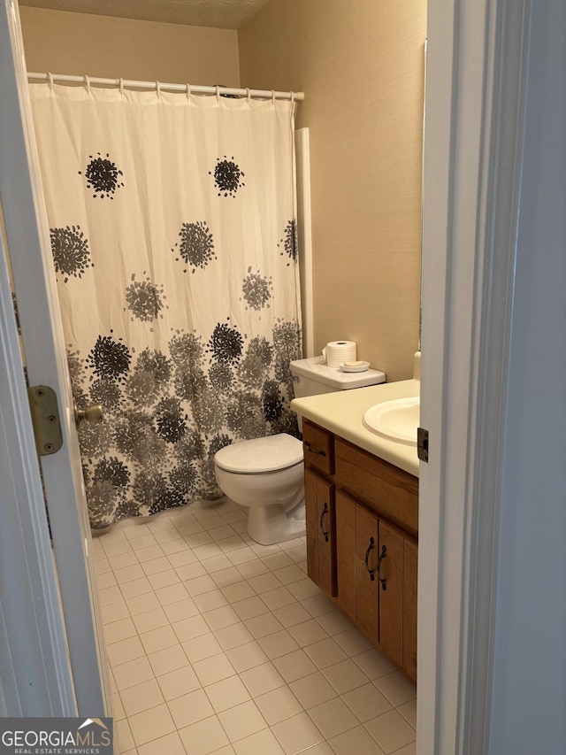 135 Courtyard Ln, Fayetteville, GA 30215 - bathroom featuring vanity, tile patterned flooring, toilet, and curtained shower