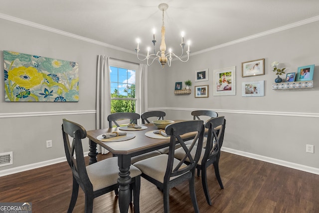 2121 Elysian Cir, Gainesville, GA 30501 - dining room featuring a chandelier, wood finished floors, crown molding, and baseboards