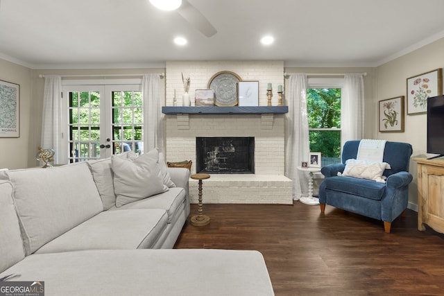 2121 Elysian Cir, Gainesville, GA 30501 - living room with ornamental molding, ceiling fan, wood finished floors, a brick fireplace, and recessed lighting