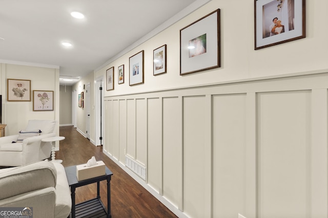 2121 Elysian Cir, Gainesville, GA 30501 - hallway featuring dark wood-style floors, recessed lighting, wainscoting, and a decorative wall