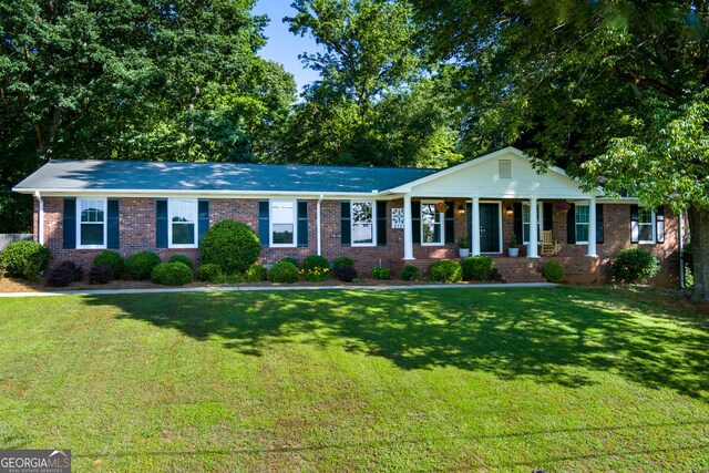 2121 Elysian Cir, Gainesville, GA 30501 - single story home with covered porch, a front yard, and brick siding
