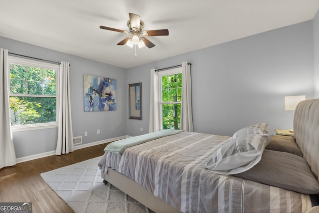 2121 Elysian Cir, Gainesville, GA 30501 - bedroom featuring baseboards, wood finished floors, and a ceiling fan