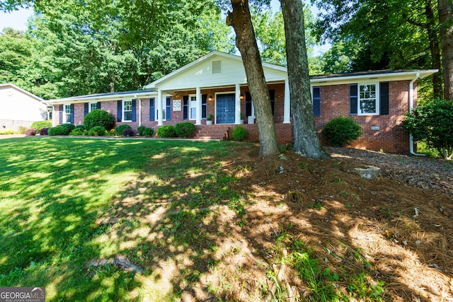 2121 Elysian Cir, Gainesville, GA 30501 - ranch-style home with brick siding, a front lawn, and a porch