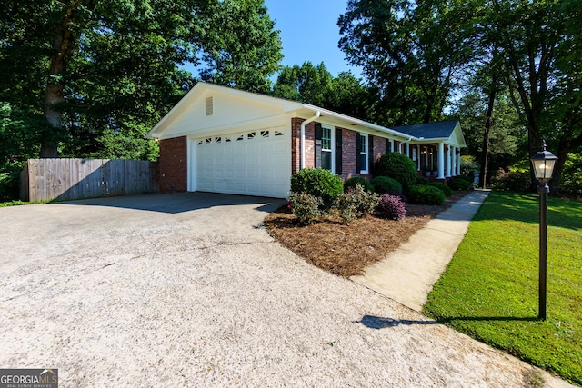 2121 Elysian Cir, Gainesville, GA 30501 - ranch-style home featuring driveway, an attached garage, and brick siding