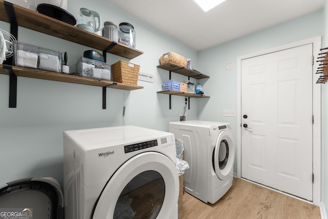 7277 Plum Creek Dr, Gainesville, GA 30507 - washroom with washer and clothes dryer and light wood-style floors
