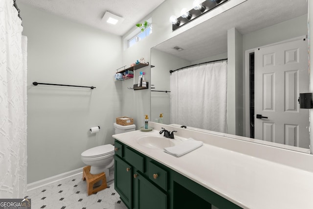 7277 Plum Creek Dr, Gainesville, GA 30507 - bathroom featuring vanity, baseboards, toilet, and a textured ceiling