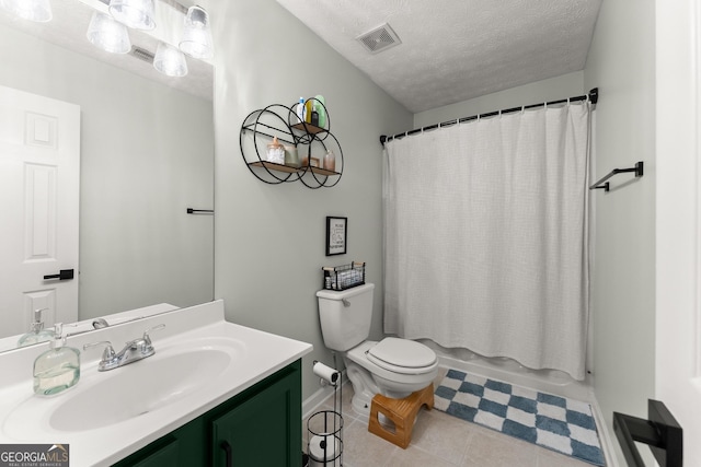 7277 Plum Creek Dr, Gainesville, GA 30507 - bathroom with vanity, toilet, a textured ceiling, tile patterned flooring, and baseboards