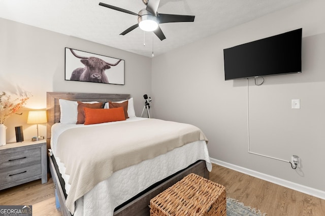 7277 Plum Creek Dr, Gainesville, GA 30507 - bedroom featuring light wood-style floors, baseboards, and ceiling fan