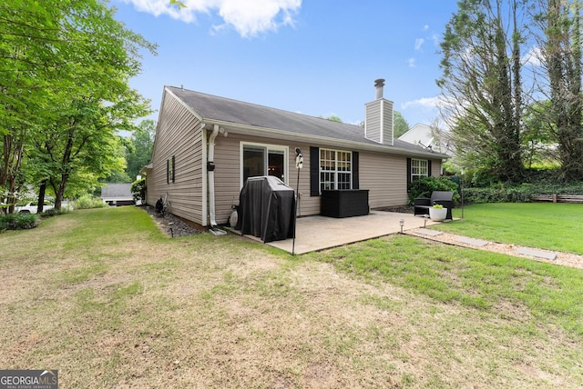 7277 Plum Creek Dr, Gainesville, GA 30507 - back of house with a patio area, a yard, and a chimney