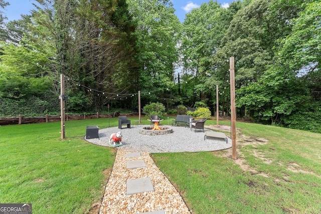 7277 Plum Creek Dr, Gainesville, GA 30507 - view of yard featuring a patio area and an outdoor fire pit