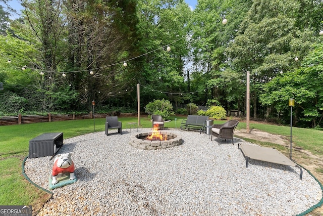 7277 Plum Creek Dr, Gainesville, GA 30507 - view of patio / terrace featuring an outdoor fire pit and view of scattered trees