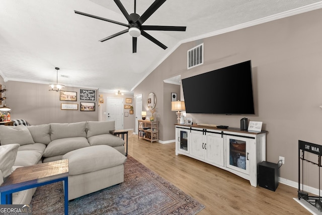 7277 Plum Creek Dr, Gainesville, GA 30507 - living room featuring ceiling fan, ornamental molding, vaulted ceiling, light wood finished floors, and baseboards