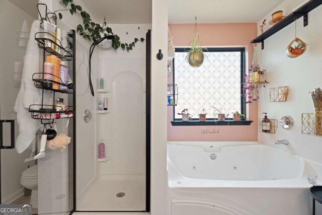 3420 Griffin Way, Cumming, GA 30040 - full bath featuring a shower stall, a jetted tub, and toilet
