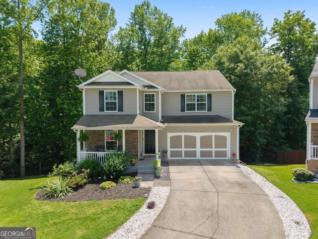 3420 Griffin Way, Cumming, GA 30040 - view of front of home with driveway, covered porch, a garage, and a front yard