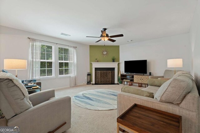 3420 Griffin Way, Cumming, GA 30040 - living area featuring a ceiling fan, carpet floors, a fireplace with flush hearth, and baseboards