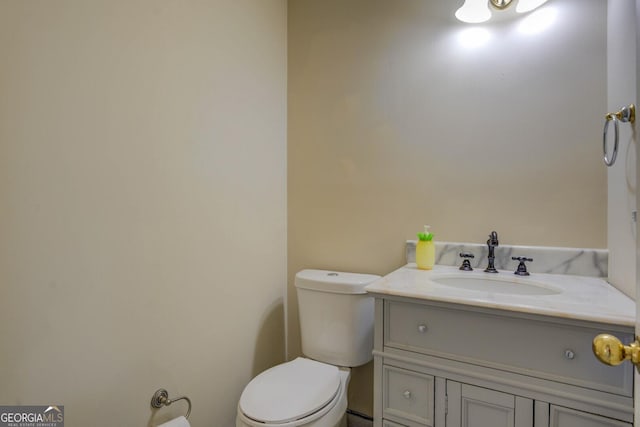 2436 Green Hollow Ct, Conyers, GA 30012 - bathroom featuring toilet and vanity