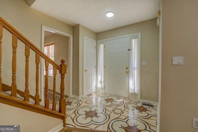 2436 Green Hollow Ct, Conyers, GA 30012 - entrance foyer with baseboards and stairs