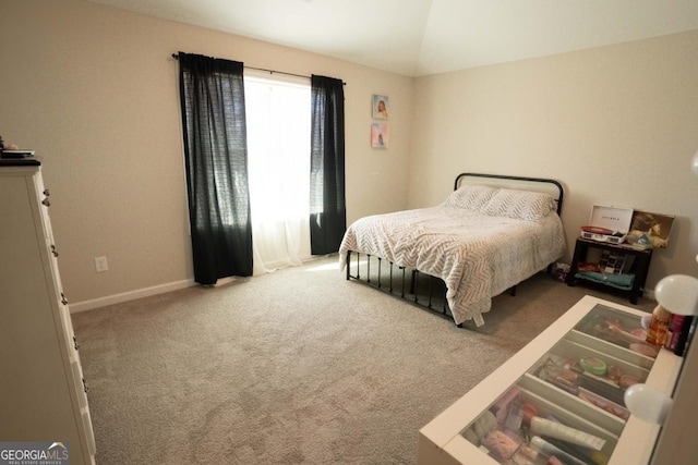 337 Paynes Lake Rd, Carrollton, GA 30116 - carpeted bedroom featuring baseboards and lofted ceiling